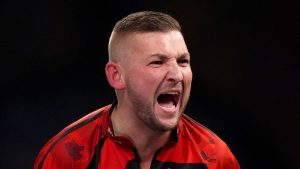 Campeonato Mundial de Dardos: Nathan Aspinall se pone nervioso para encontrarlo mientras Christian Kist golpea nueve dardos en la derrota