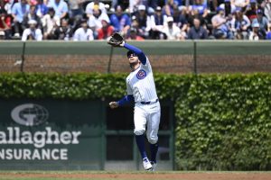 Ben Brown brilla en el montículo como Reds fáciles de Cachorros