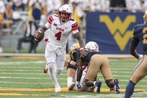 Deadspin | Devon Dampier lanza cuatro TD al manual de Utah a la avenida Rout of West Virginia